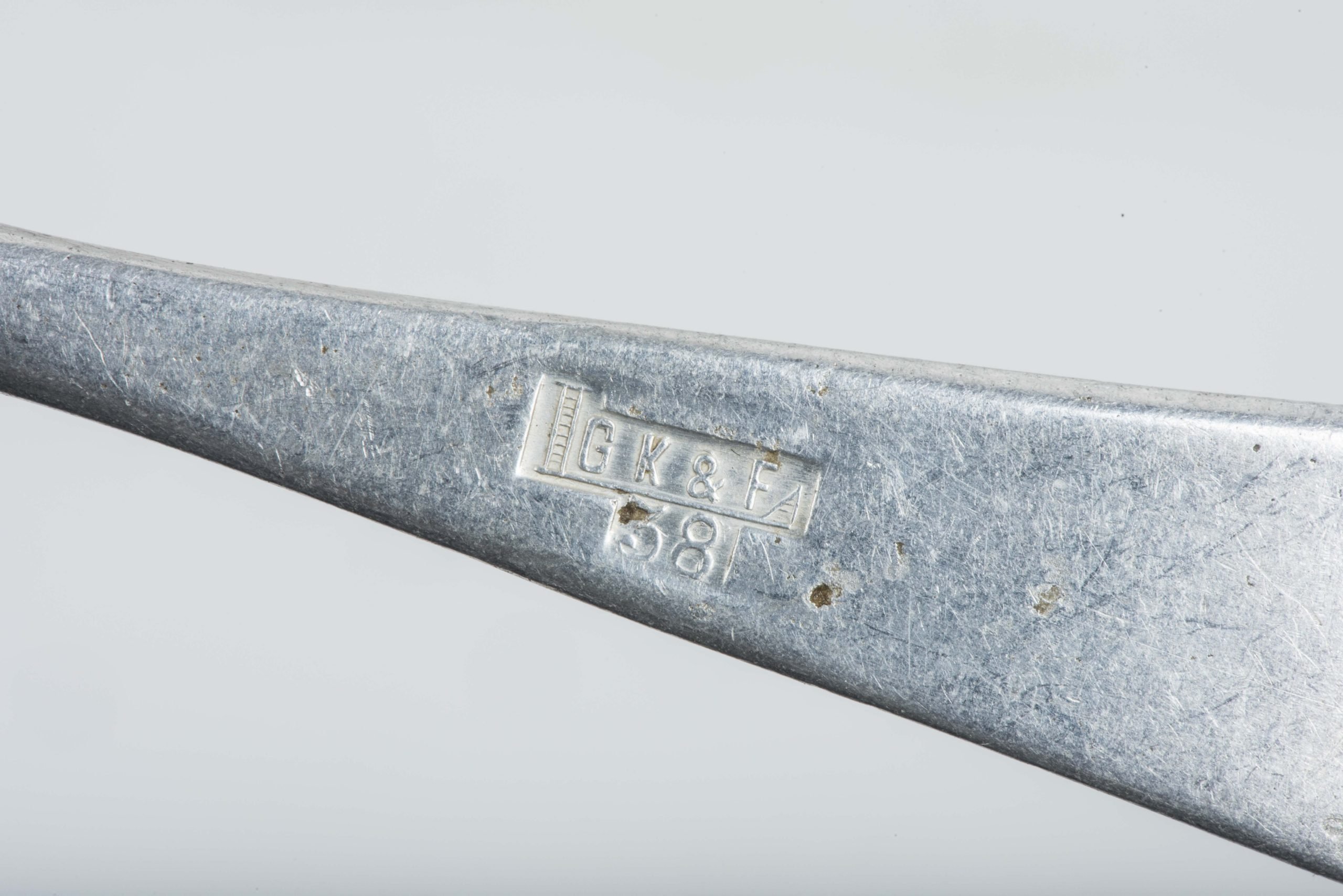 Aluminum Luftwaffe tea spoon marked FLUV and IGK & F 38 — image 4