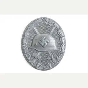 Silver wound badge marked 65