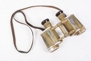 Tan 6×30 binoculars marked CAG