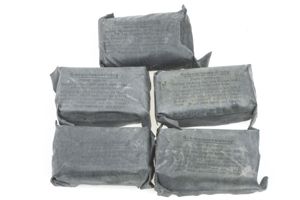 5 matching bandages in black rubberised pouch dated 1939