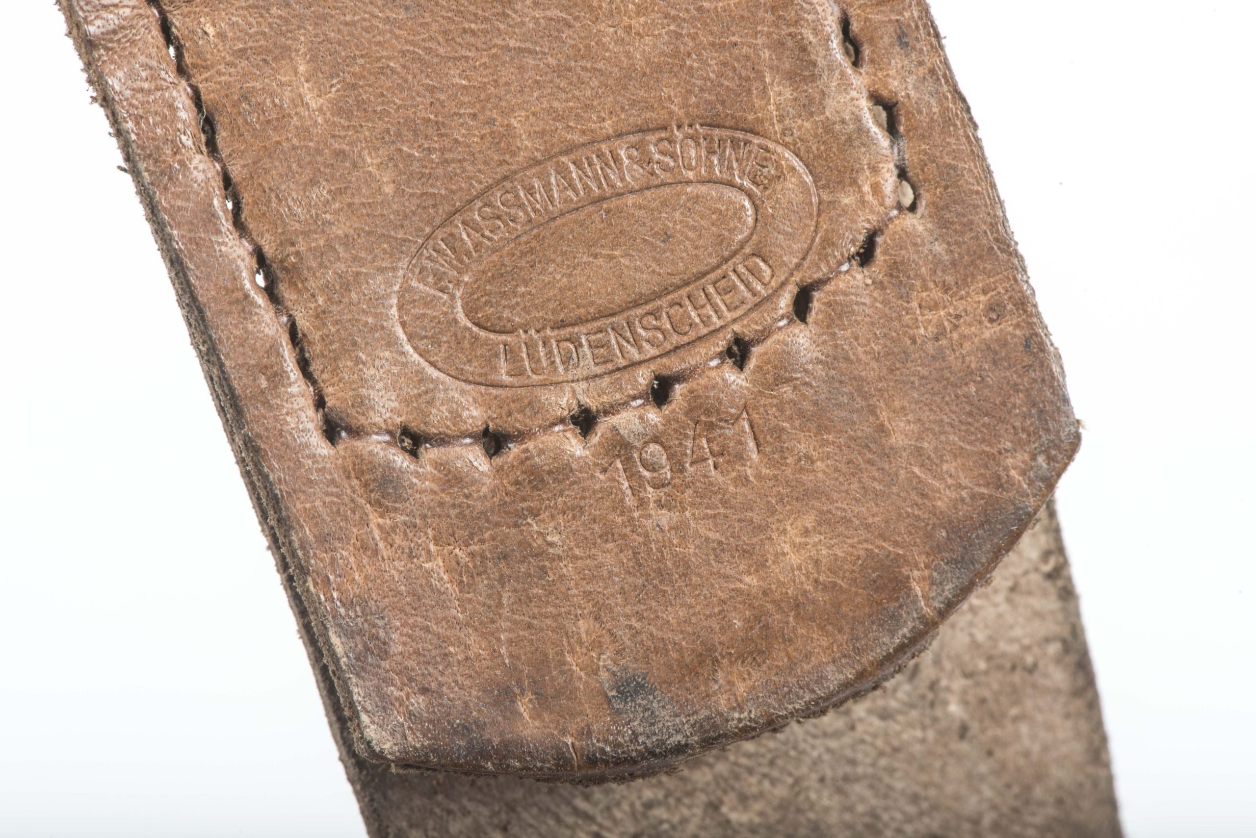 Leather belt buckle tab marked F.W. Assmann & Söhne, Lüdenscheid 1942 — image 3