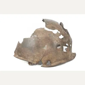 Battledamaged Italian camouflaged M33 helmet