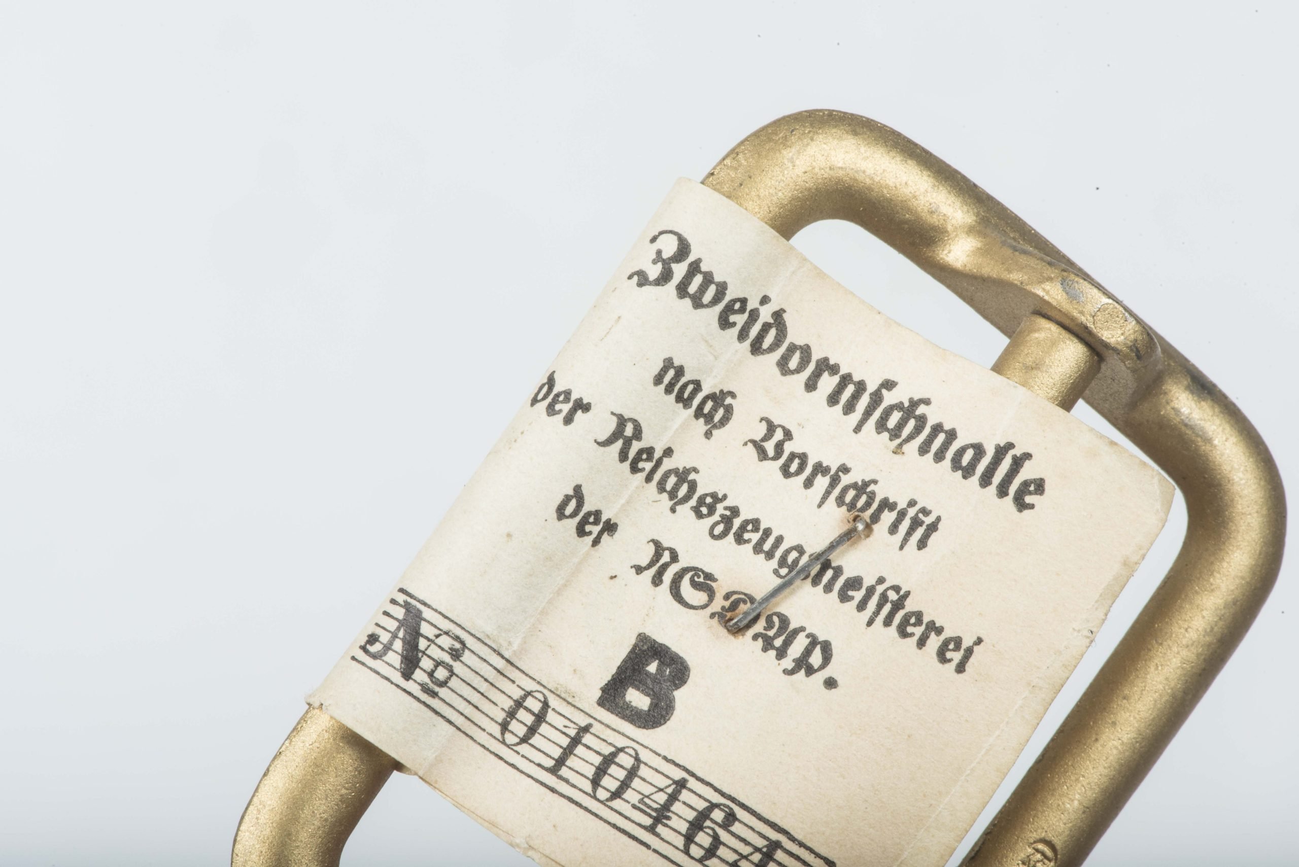 Political belt buckle marked RZM M5/71 with RZM tag — image 5