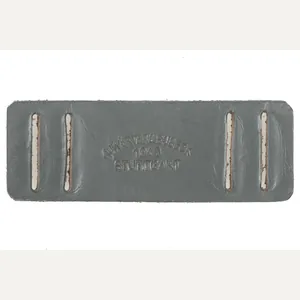 Rare unissued leather gasmask strap reinforcement marked Auwärter & Bubeck, …