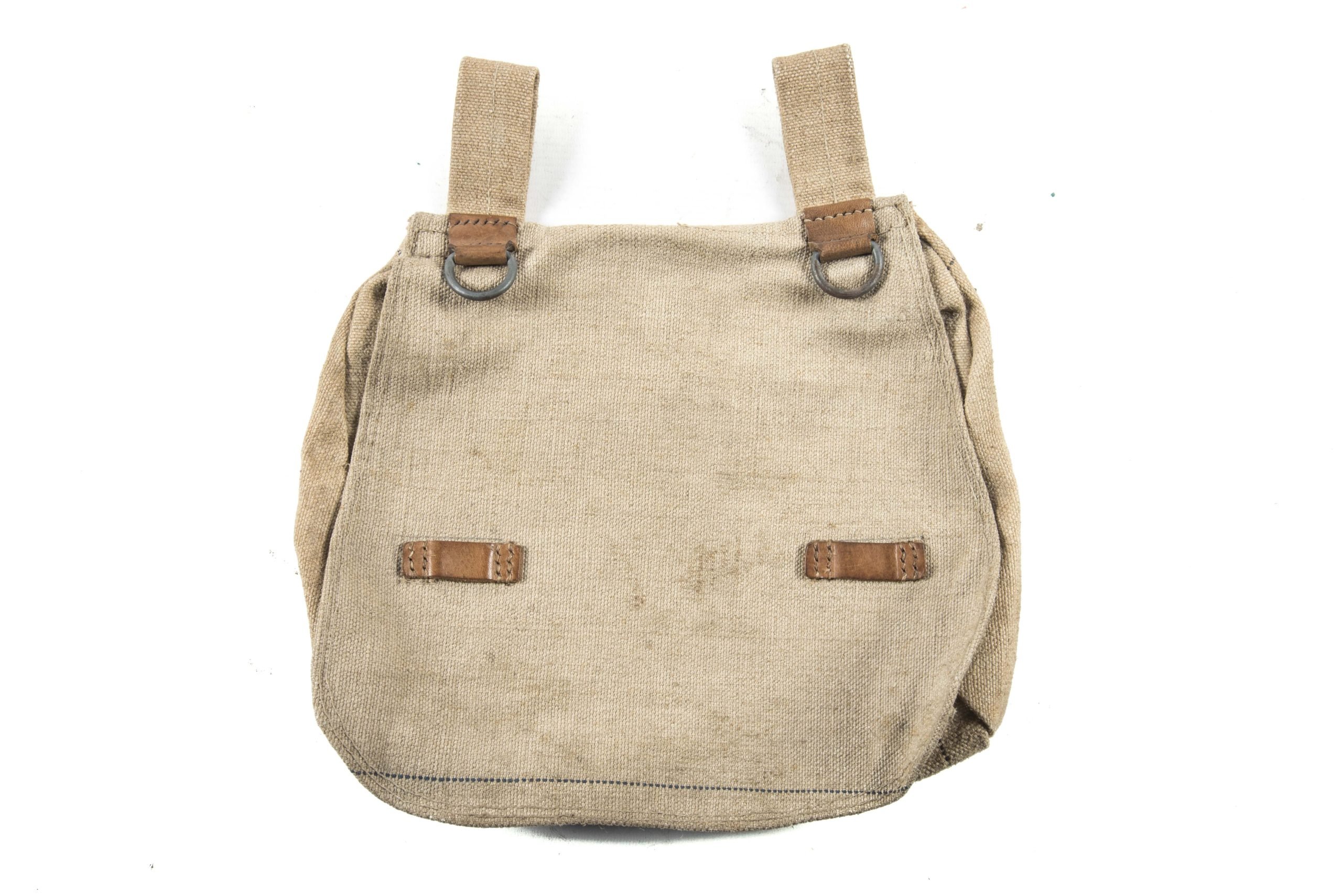 Unissued late war simplified M44 made from coarse blue lined canvas