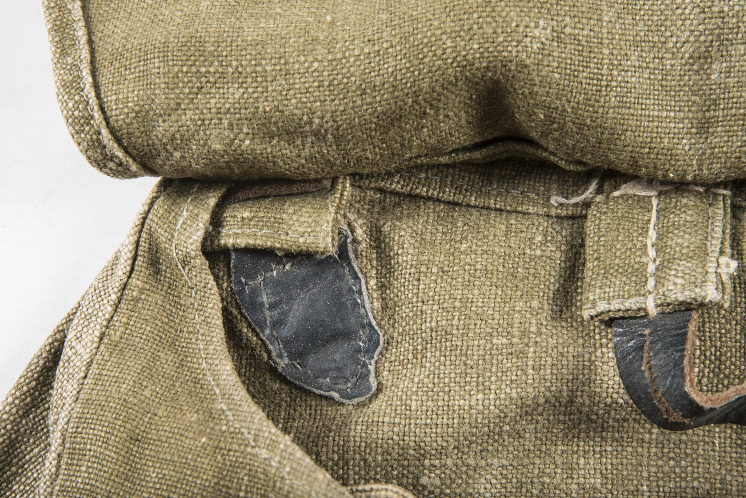 Late war M31 breadbag made in coarse captured canvas and Italian leather with matching strap — image 9