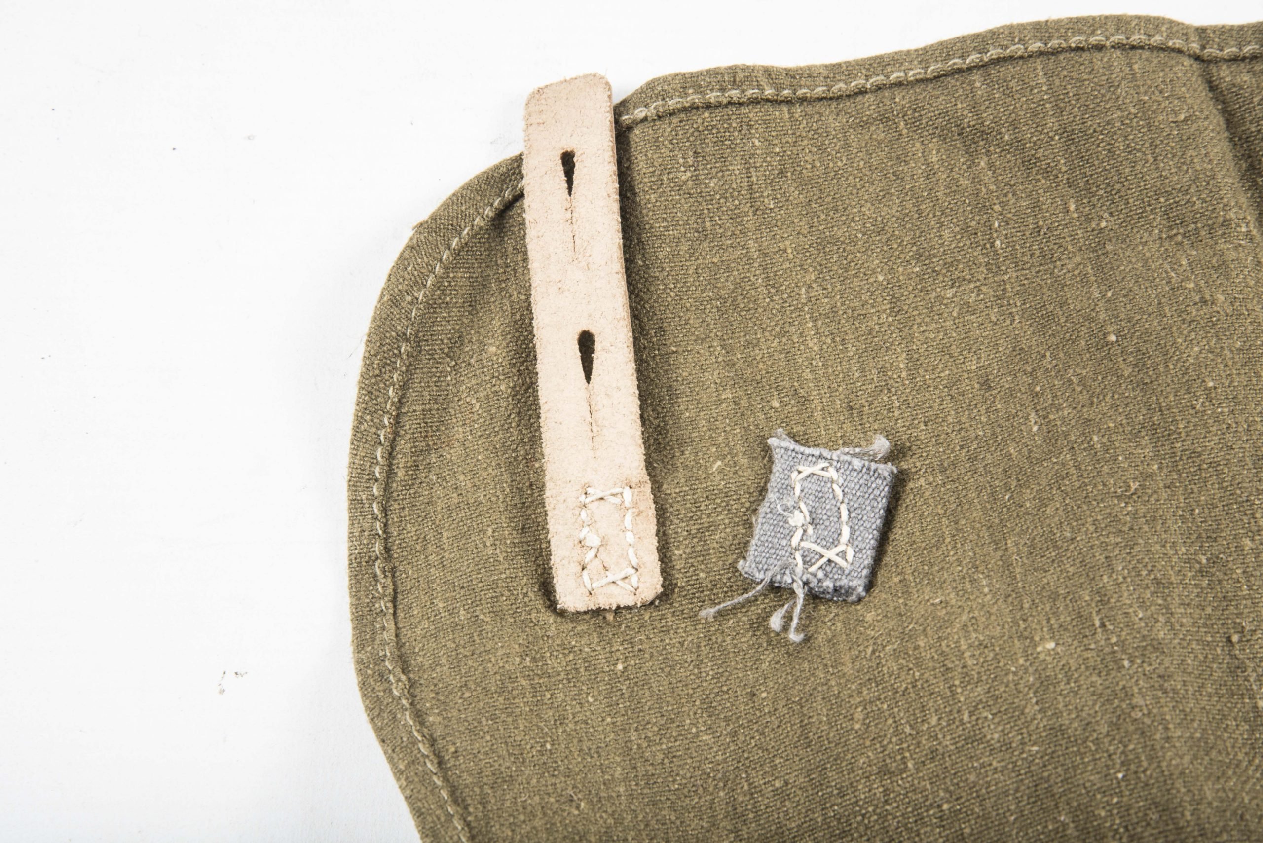 Unissued late war simplified M44 breadbag with matching strap — image 7