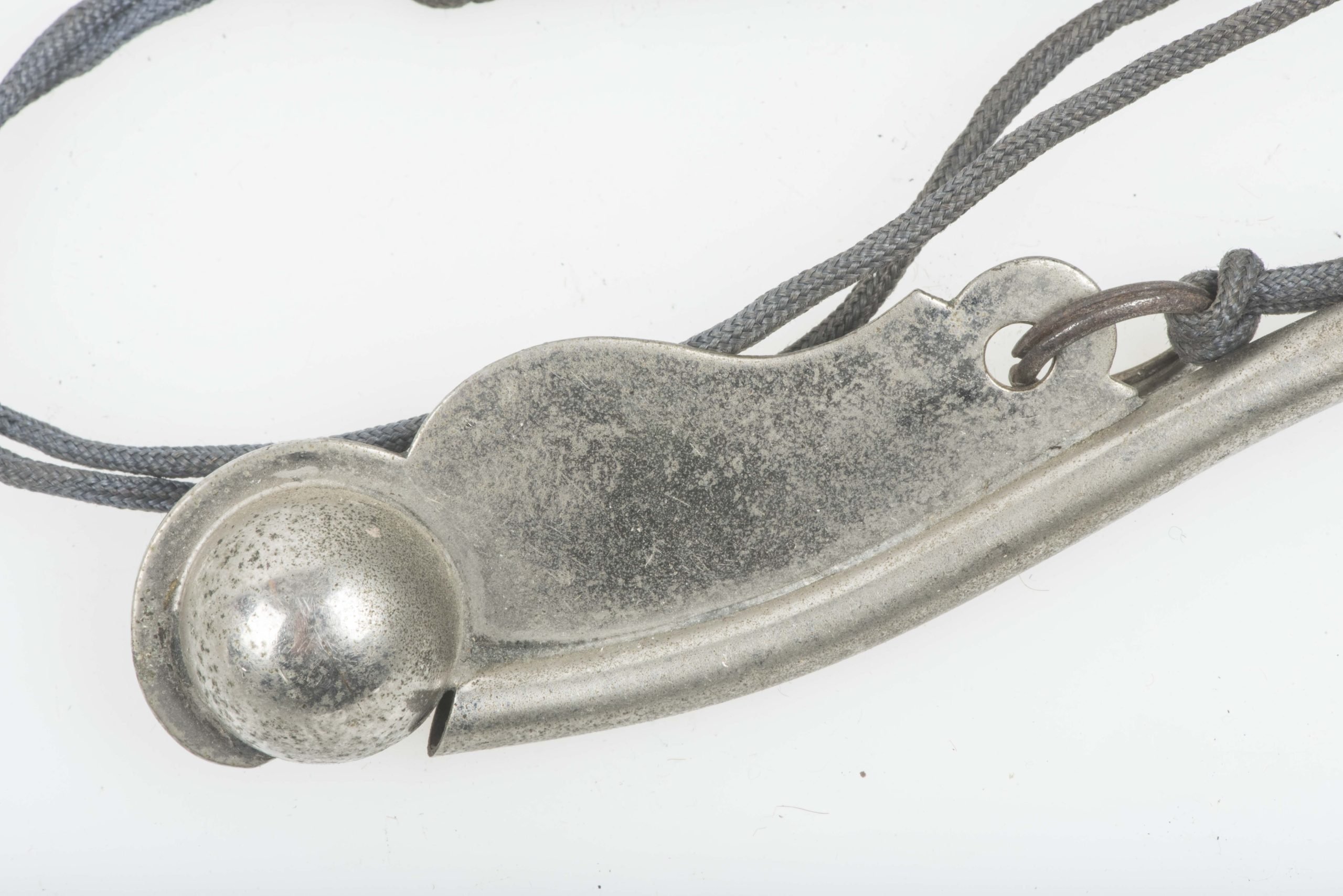 Issue Kriegsmarine whistle with grey rayon lanyard — image 6