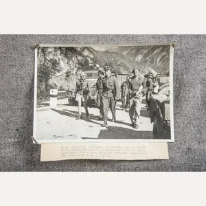 Press Photo; LAH Ostuf surrenders to British Armoured officer armed …