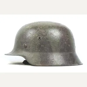 Battle damaged ET66 M42 single decal Heer helmet in brush …