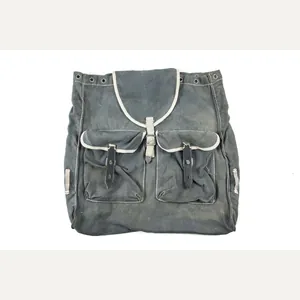 Blue rucksack with gasmask canister strap parts marked ebd 44