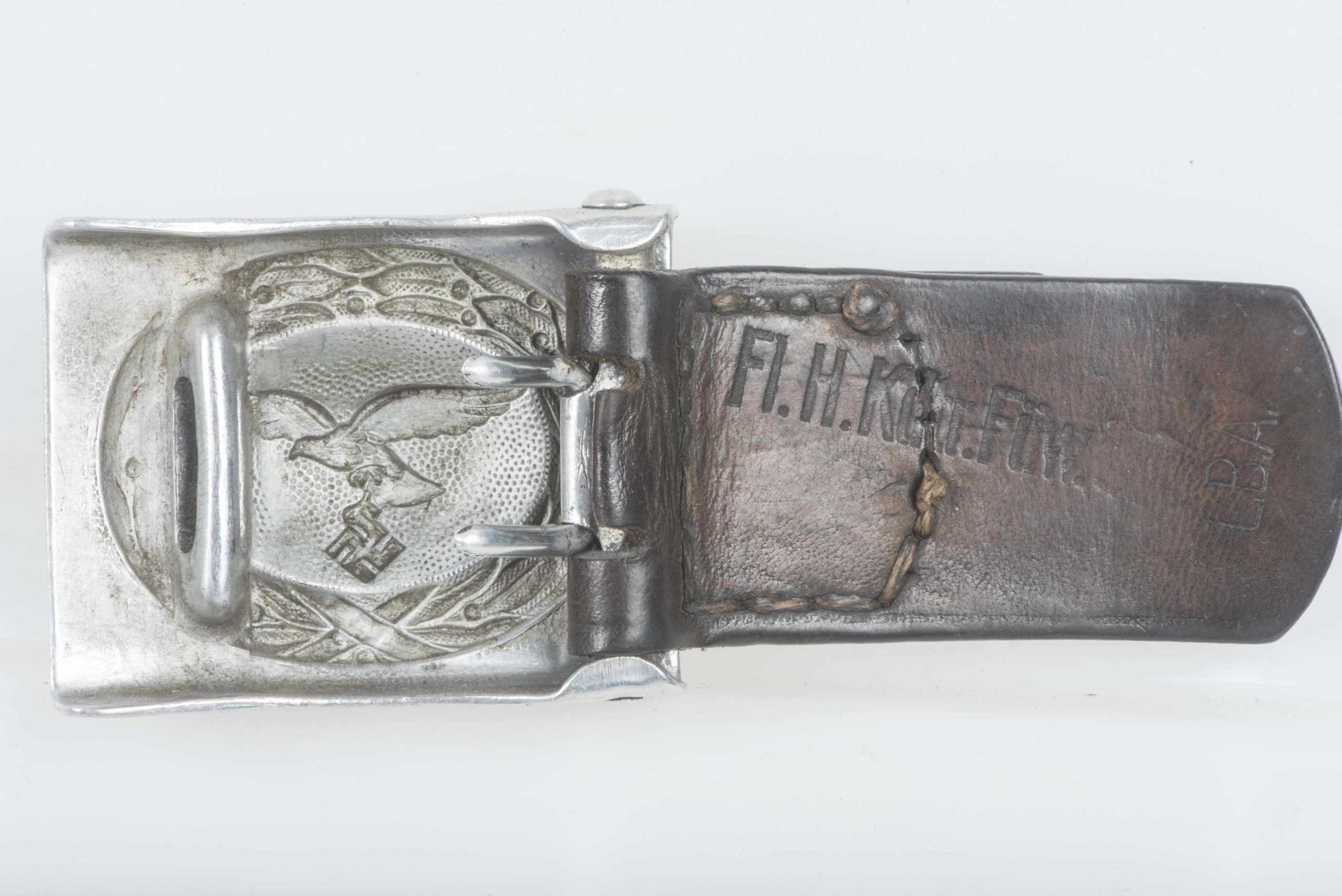 Tabbed aluminium Luftwaffe belt buckle by Berg u. Nolte A.-G., Lüdenscheid 1939 marked Fl.H.Kdtr.Füw. LBA — image 5