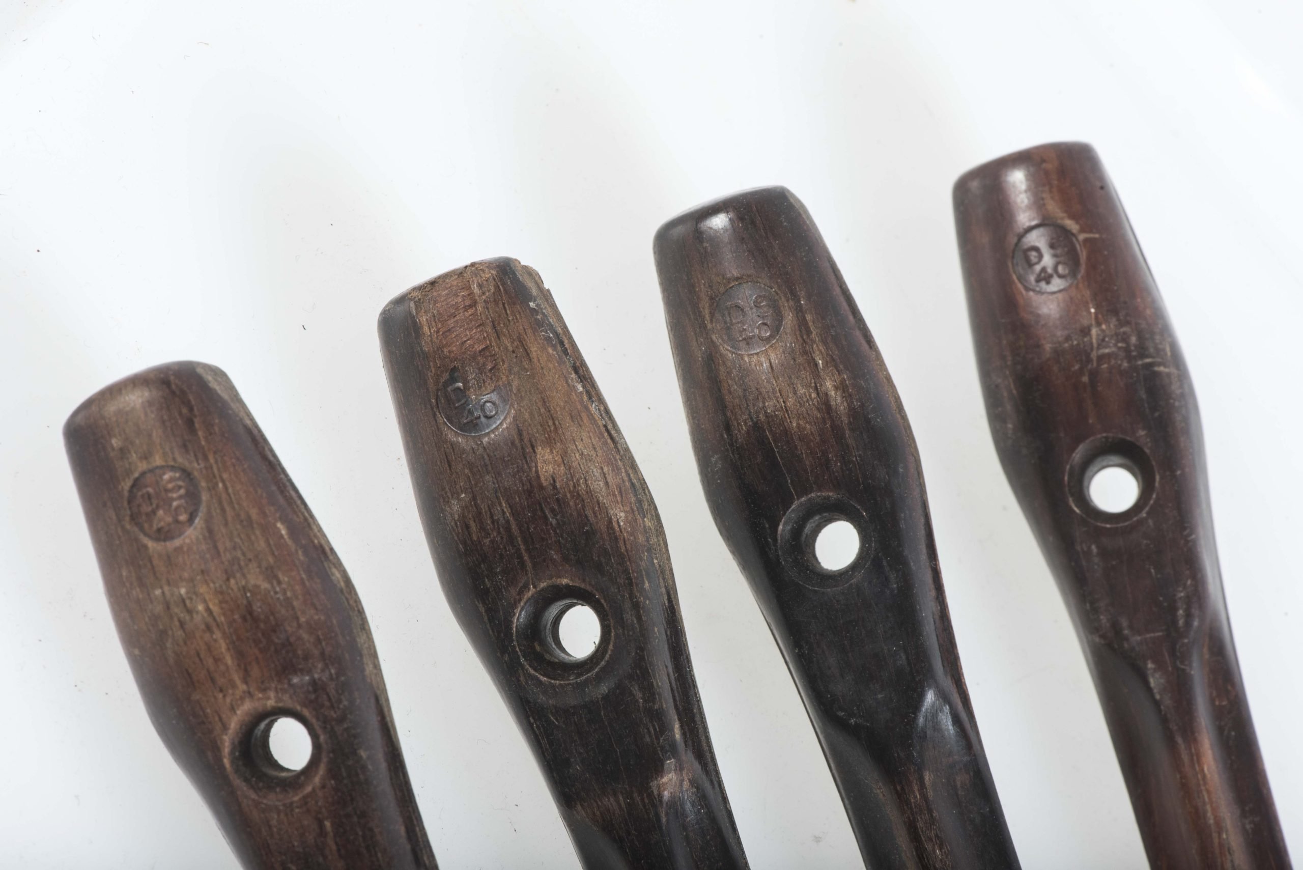 Four matching Zeltbahn pegs marked DS 40 — image 2