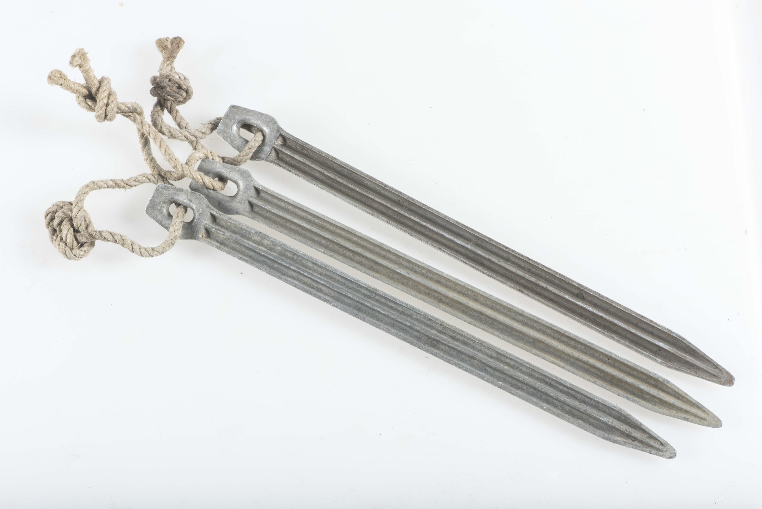 Three matching Zeltbahn pegs marked C&CW 38 — image 3