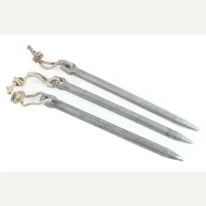 Three matching Zeltbahn pegs marked C&CW 38