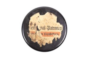 Bakelite flare container with red label