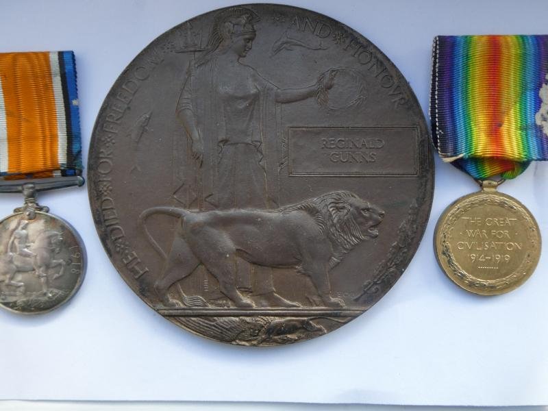 BRITISH WAR AND VICTORY MEDAL-BRONZE MEMORIAL PLAQUE-TO REGINALD GUNNS-NORFOLK REGT-DIED OF WOUNDS ON 26/10/1916 — image 2