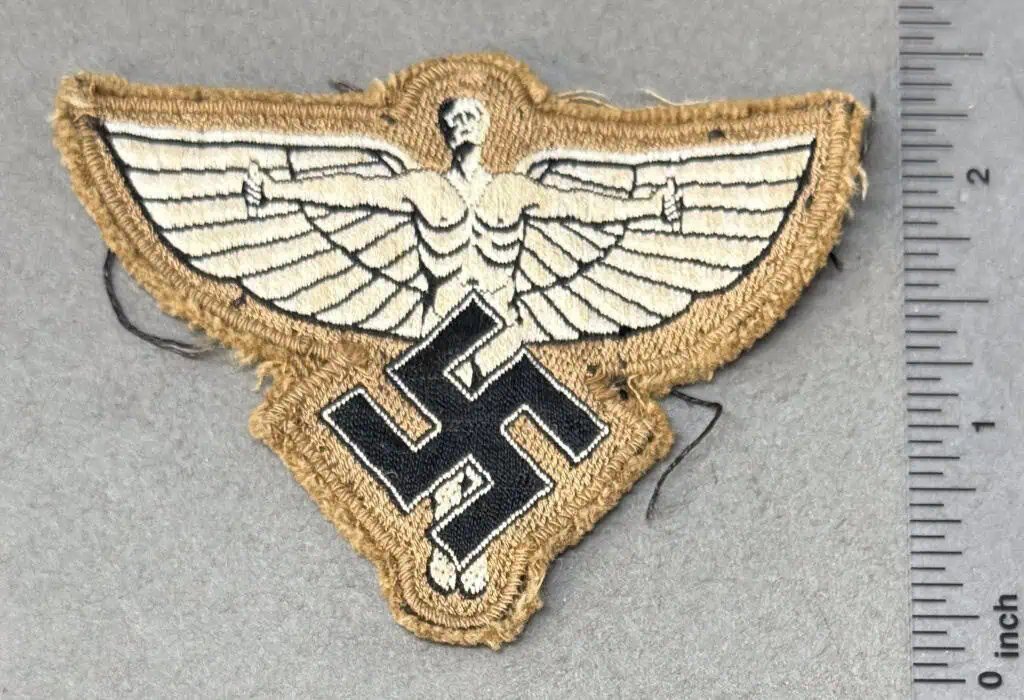 Original WWII German Uniform Removed NSFK SLEEVE/BREAST INSIGNIA. (NSFK Abzeichen) Brought Home By A U.S. Soldier Certified