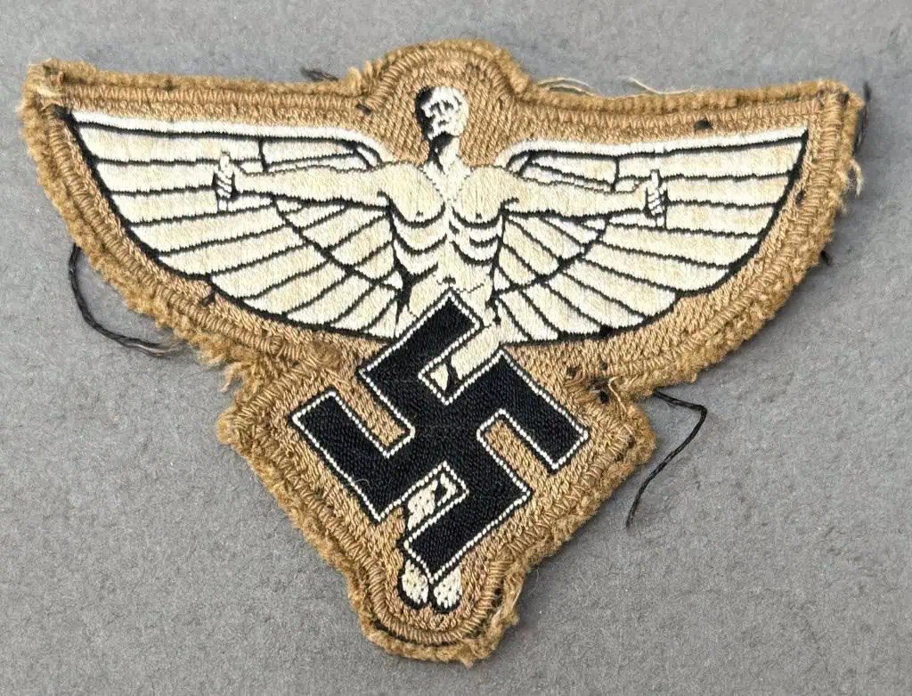 Original WWII German Uniform Removed NSFK SLEEVE/BREAST INSIGNIA. (NSFK Abzeichen) Brought Home By A U.S. Soldier Certified — image 2