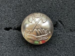 Pakistan military button