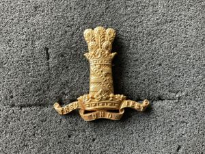 11th Hussars Officers gilt cap badge.