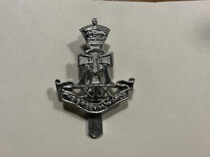 Anodised Green Howards cap badge by Firmin.
