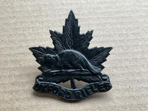 WW2 Canadian Oxford Rifles cap badge, blackened brass.