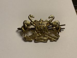 Merchant Taylors school O.T.C gilded brass cap badge