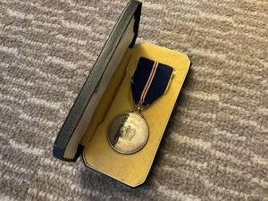 Malaysia; Order of the Defender of the Realm medal.