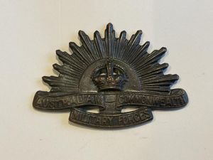 WW2 Australian Rising sun collar badge by H.ARENDSEN