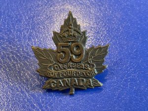 WW1 C.E.F 59th Infantry Battalion cap badge, ( error version)