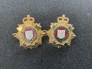 Officers Royal Logistics Corps collar badges.