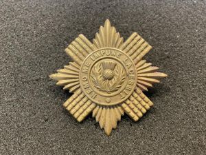 Scots Guards Broderick cap badge circa 1902-5.