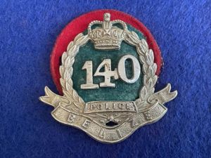 Post 1952 Belize Police cap badge issued to Constable 140.
