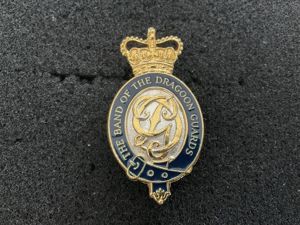 The band of the dragoon guards cap badge