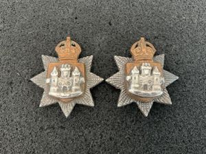 WW1/2 East Surrey Regiment officers collar badges.