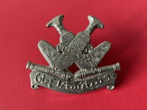 Oman Coast Regiment cap badge.