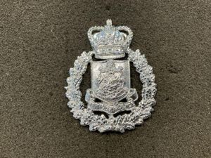 Q/C Bermuda Police cap badge.