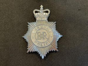 Q/C Bermuda Police Helmet plate.