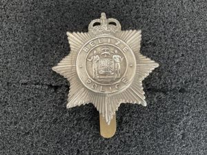 Q/C Belize Police cap badge made by FIRMIN LONDON.