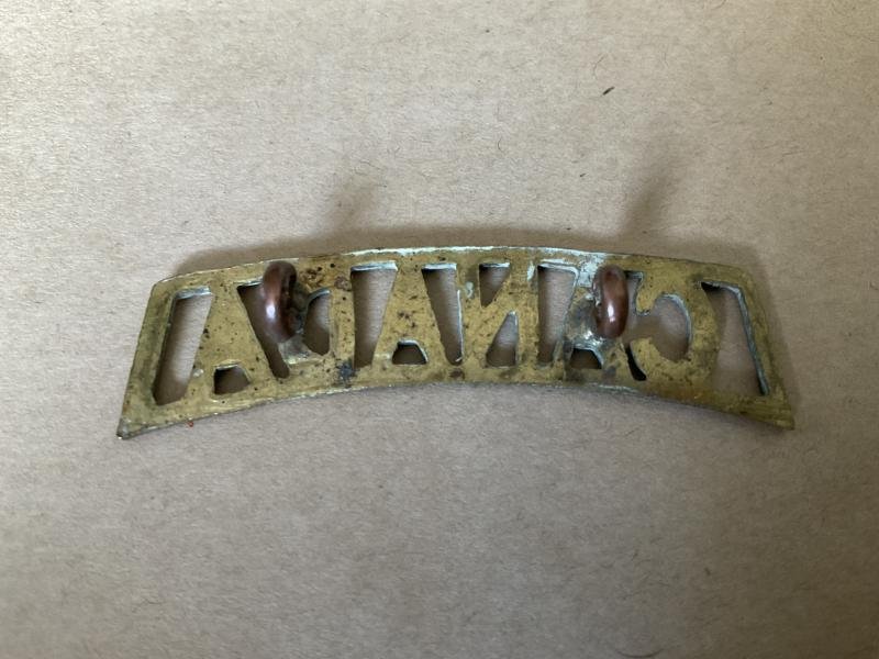 WW1 CANADA brass shoulder title , voided example — image 2