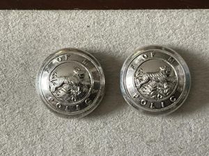 1951 dated silver Federation of Malay Police cap buttons.