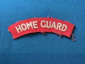 Post war cloth red wool HOME GUARD shoulder title.