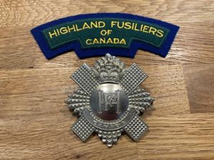 Highland Fusiliers of Canada cap badge & shoulder title.