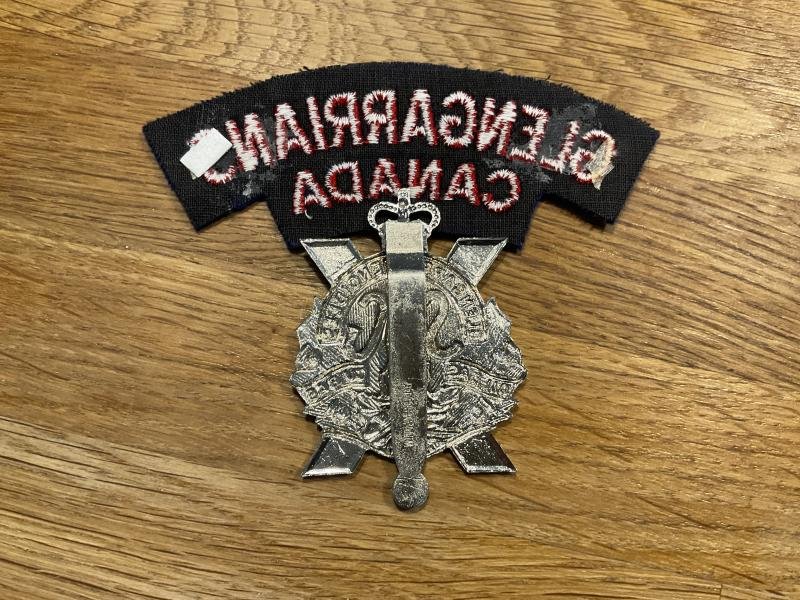 The Stormont, Dundas & Glengarry Highlanders cap badge & title. — image 2