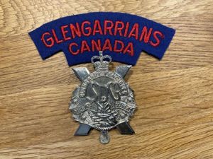 The Stormont, Dundas & Glengarry Highlanders cap badge & title.