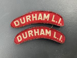 WW2 DURHAM L.I Calico printed shoulder titles.