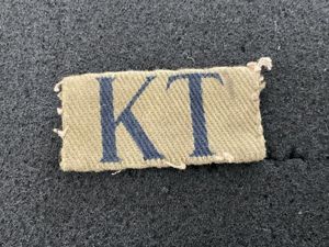 WW2 Home Guard KT (Kent) printed district designation badge.