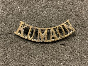 Indian Army, KUMAON Regiment black brass shoulder title.