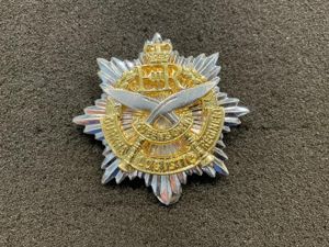 Queens own Gurkha Logistic Regiment cap badge by Firmin.